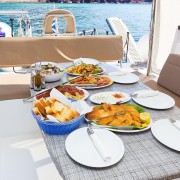 From Santorini: Catamaran Cruise with Meals and Drinks