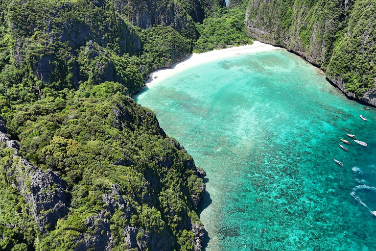 Phi Phi: 7 Islands longtail boat with Sunset and Plankton