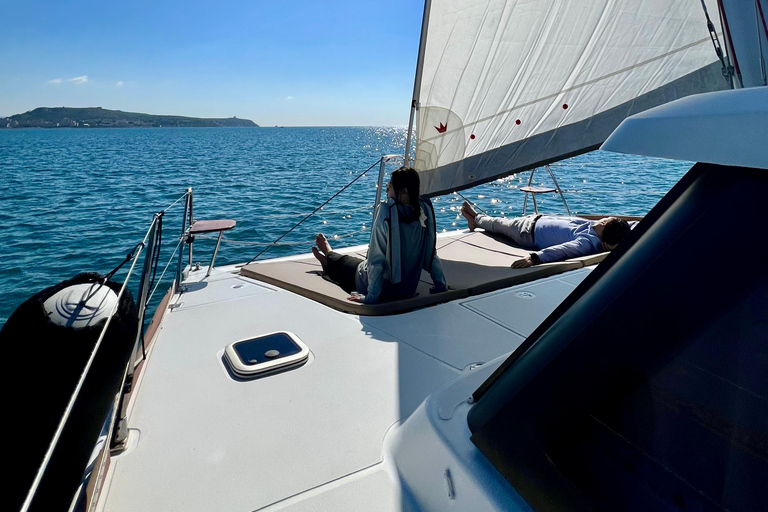 Cagliari: Catamaran Tour, Swimming, Snorkeling, & Prosecco Cagliari: Sailing Tour with Snorkeling and a Prosecco Toast