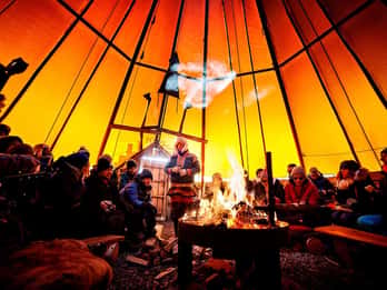Reindeer camp dinner with a chance of northern lights