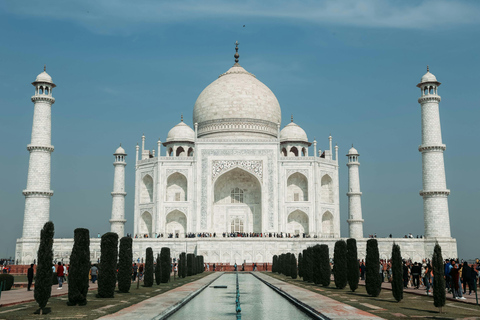 From Delhi: Sunrise Taj Mahal & Agra Fort Day Trip by AC Car Tour Guide Services Only