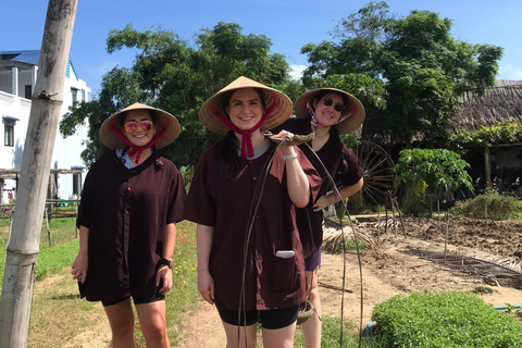 Farming with Farmers at ancient vegetable Village "Tra Que"