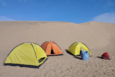 Huacachina: Overnight Camping with Sandboarding/Sandsky, Bar, BBQ, and Campfire