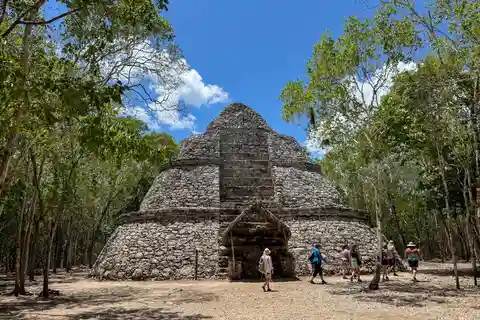 From Cancun: Tour to Tulum and Coba with cenote visit and buffet lunch.