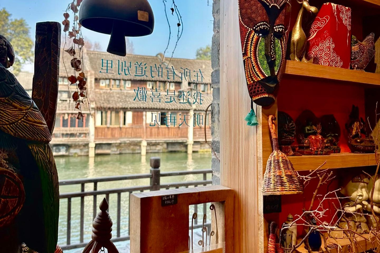 Hangzhou: Wuzhen Water Town Day Trip with Boat Ride Guide for English