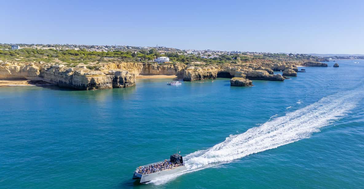 Dolphins & Benagil Caves Catamaran - Marine Biologist — a boat tour from Lagos, Portugal