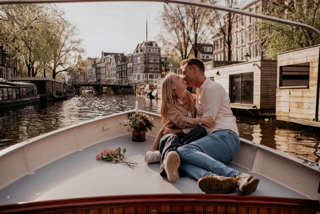 Visit Amsterdam: Romantic Private Canal Tour and Prosecco & Snacks in Netherlands