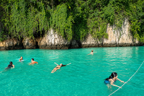 From Phi Phi: Iconic Bays by Longtail—Beach, Lagoon, Snorkel Phi Phi: Longtail Join Trip — Bays, Beach & Snorkeling