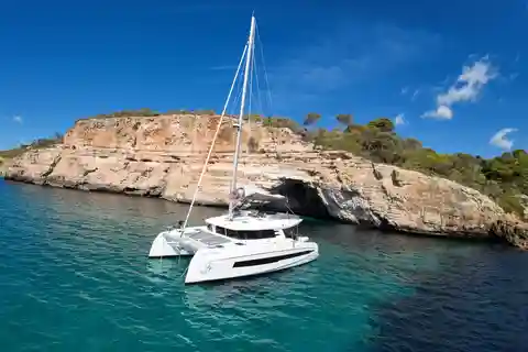 Lagos: Cliffs and Secret Caves in a Cervetti 44 Sail