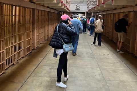 Inside the Alcatraz Cellhouse with audio tour devices