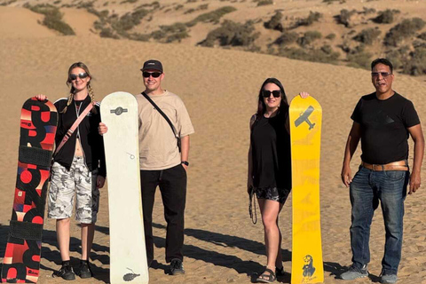 Expérience dans le désert de Timlalin au coucher du soleil, balade à dos de chameau et spectacle de feuExpérience au coucher du soleil dans le désert de Timlalin, balade à do