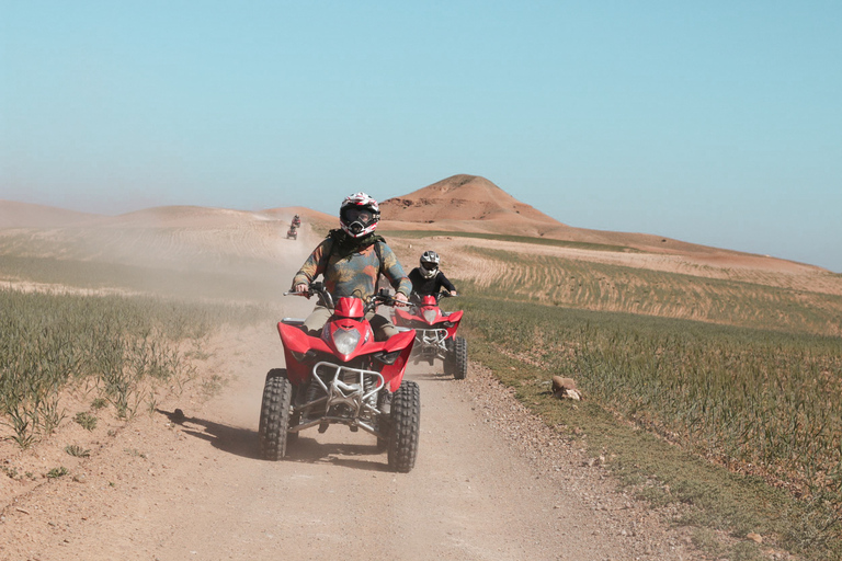 Marrakech: Excursão de meio dia em um quadriciclo no deserto com passeio de camelo