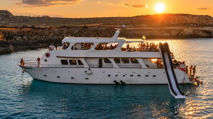 Protaras: Luxury Sunset Yacht Trip with Slide, BBQ & 1 Drink