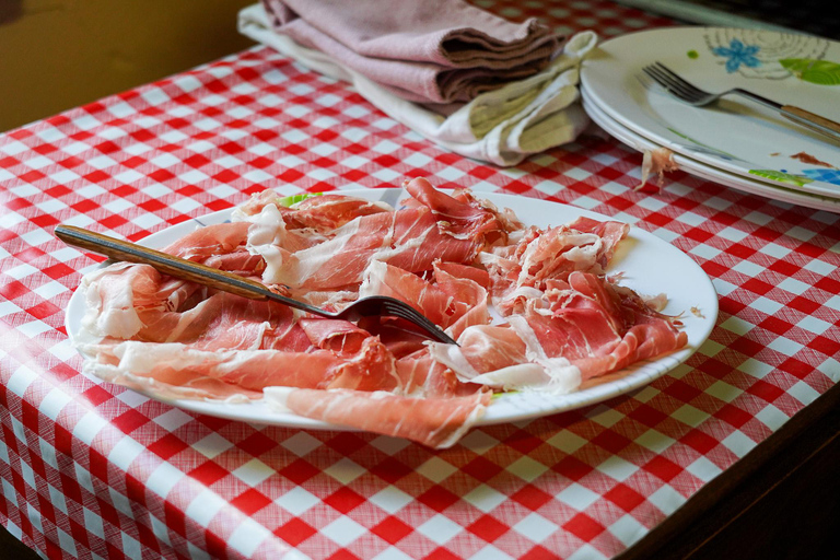 From Bologna: Parma, Parmigiano, and Prosciutto Tour by 1st-Class Train Parmesan and Prosciutto PDO Tour from Parma: a smart experience!