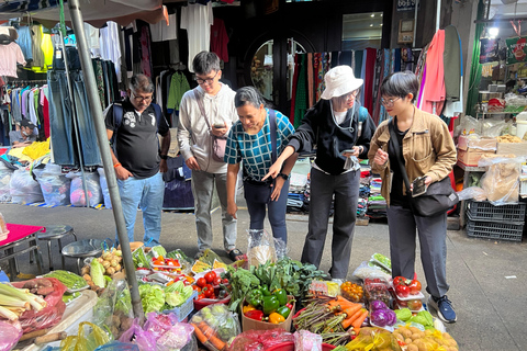 Privétour met kookles en vrouwelijke gids in Ho Chi Minh