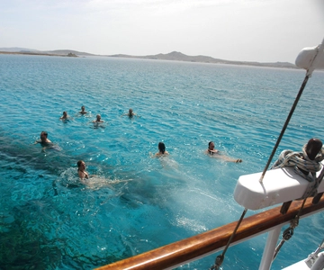 Mykonos: Crociera in barca al tramonto con 1 drink