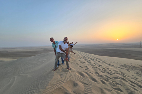 Sunrise or Sunset desert Safari with Sandboarding in Qatar