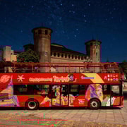 Passeio noturno em Turim de autocarro aberto