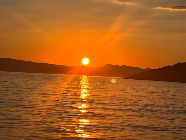 Zonsondergangcruise - Zwemmen bij GOLDEN BEACH + cocktail