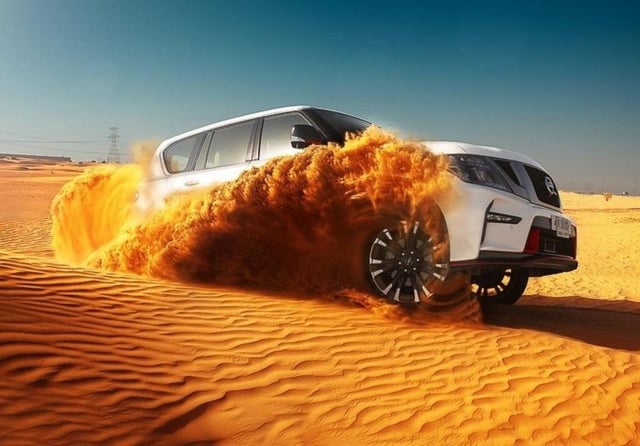 Dubai: Desert Safari with Camel Ride, Shows and BBQ Dinner