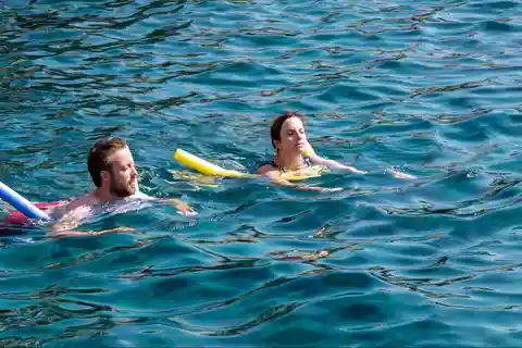 From Faliraki: Rhodes Sunset Cruise with Swimming