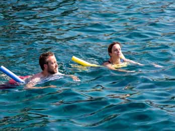 Från Faliraki: Rhodos solnedgångskryssning med bad