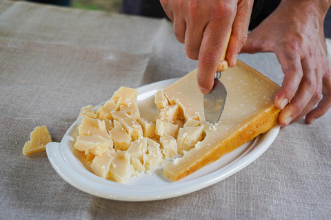 From Bologna: Parma, Parmigiano, and Prosciutto Tour by 1st-Class Train Parmesan and Prosciutto PDO Tour from Parma: a smart experience!