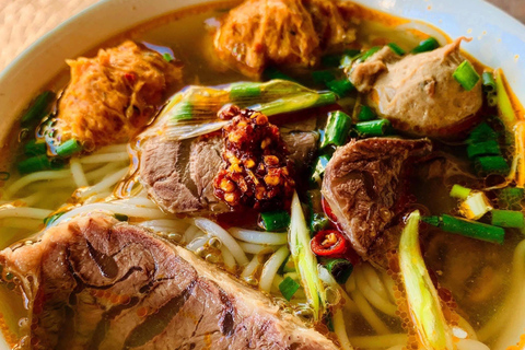 Hue: Night Street Food Tour by Cyclo with a Local Guide