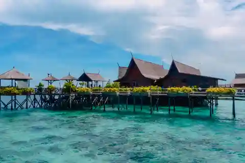 Semporna: Excursión a Mabul y Kapalai en snorkel o buceo y almuerzo