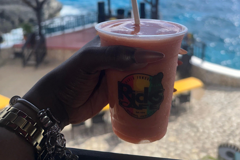 Negril Day Trip to Rick's Cafe & 7 Mile Beach from Falmouth