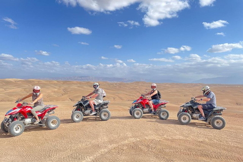 Quade biking in agafay desert with sunset and dinner show