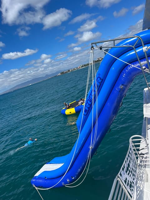 3 Hour Waikiki Waterslide and Ocean Playground Cruise | GetYourGuide