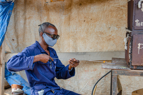 Kampala: Glassblowing, Beadmaking, and More Art Experience Blowing Glass Bubbles