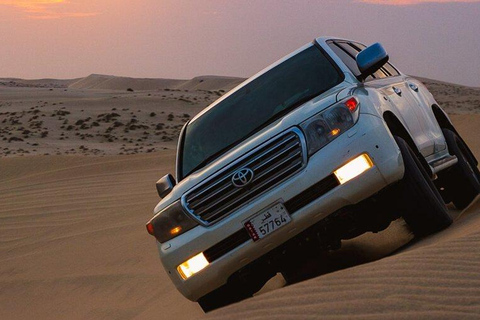 Doha: Safari privado por el desierto con paseo en camello y Sandboarding