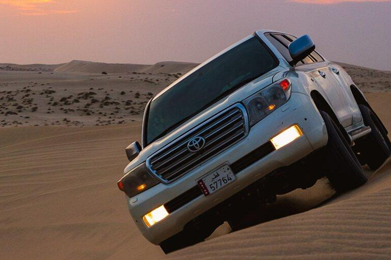 Doha: Safari privado por el desierto con paseo en camello y Sandboarding