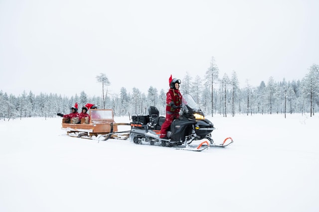 Rovaniemi: Snowmobile sleigh ride with Santa's Elf