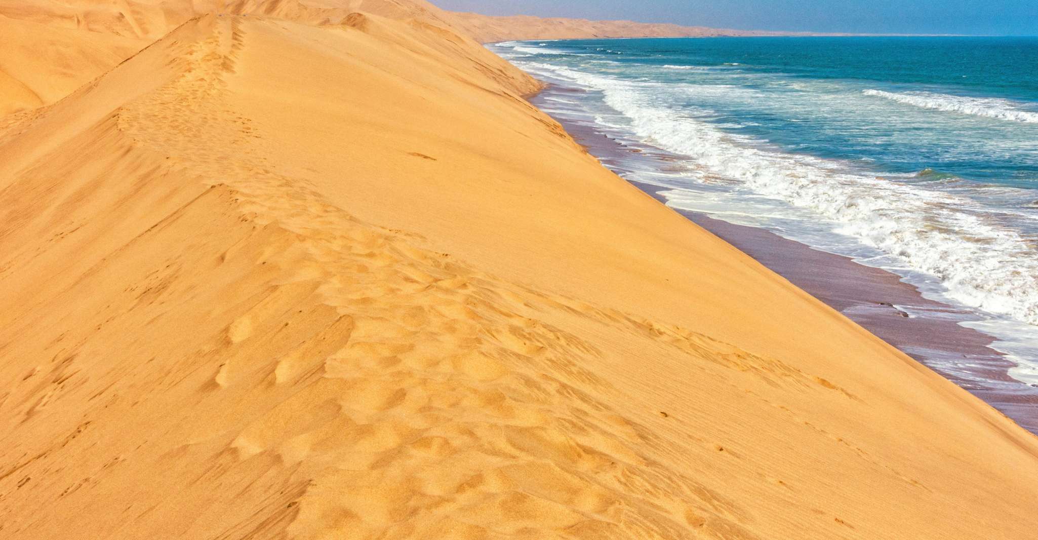 Doha: Dune Safari, Camel Ride, & Sandboarding with Transfer photo 9