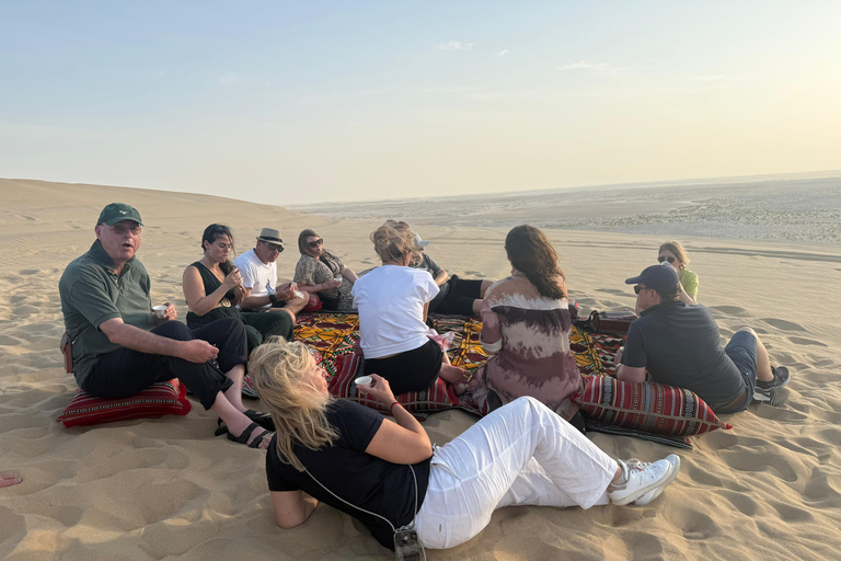Doha: inland sea Tour With Dune Bashing &Sandboarding fun Doha: safari , camel ride, sandboarding hotel pickup
