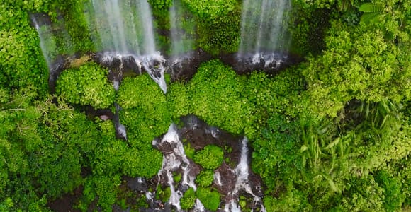 Benang Stokel & Kelambu Waterfalls: Culture, Beach & Sunset