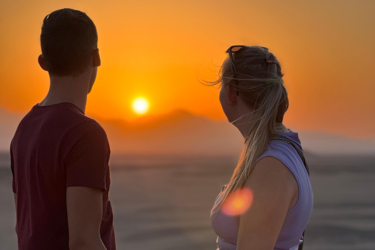 paseo en camello con puesta de sol y observación de estrellas