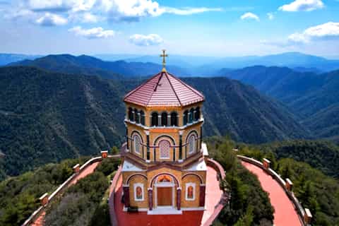 Kykkos Monastery exterior golden domes in Troodos Mountains