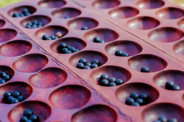 Learn Rwandan Table Game (IGISORO) with a Local