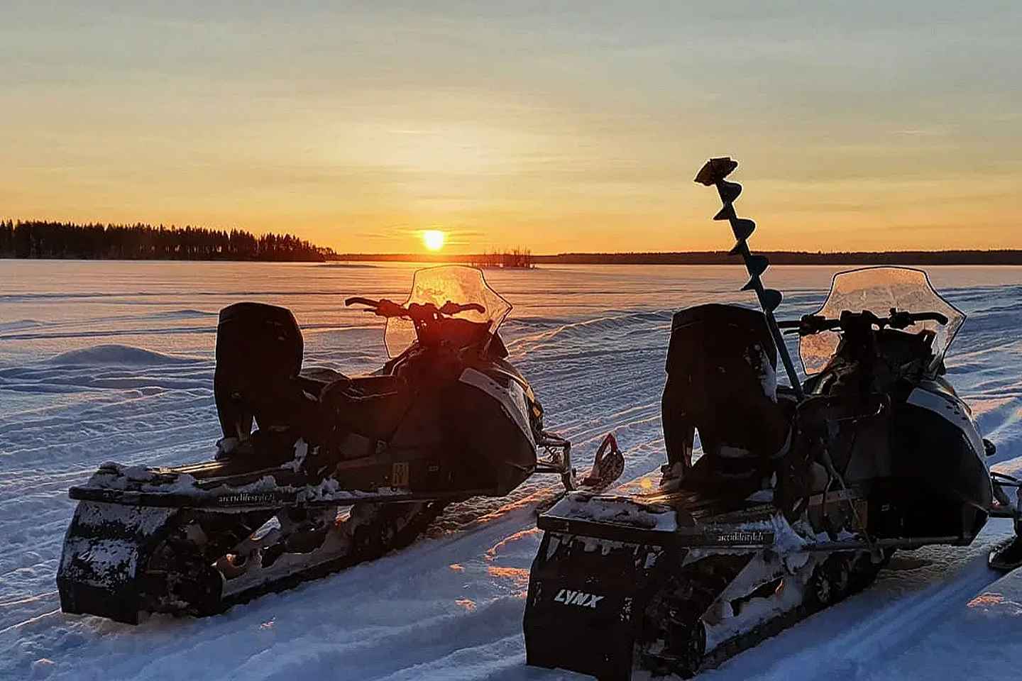 Rovaniemi: Ice Fishing by Snowmobile