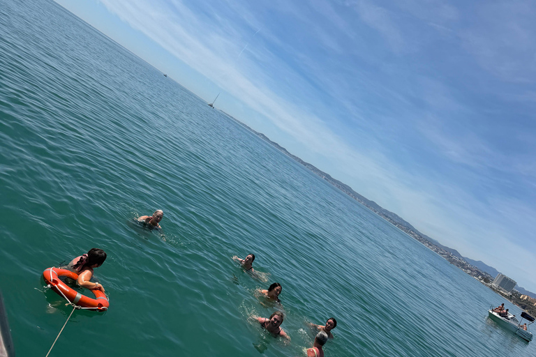 Benalmádena Catamaran Sightseeing Tour: Tapas Food Tasting, Drinks, Swimming & Dolphins Benalmádena Catamaran Tour: Tapas Tasting, Drinks, Swimming, and Dolphins