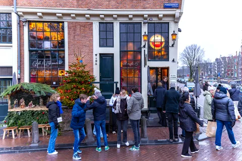 Excursie Amsterdam: Hoogtepunten wandeling & grachtenrondvaart