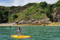 Pembrokeshire, Paddle Boarding en Tenby North Beach - Housity