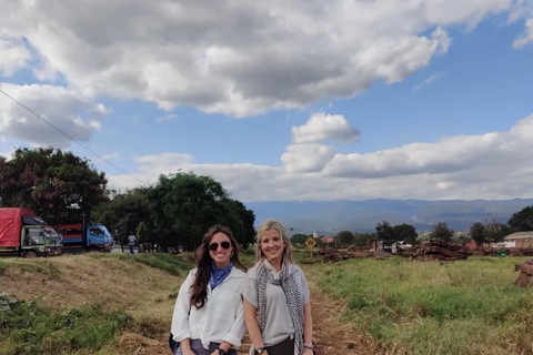 Moshi or Arusha: Guided Town Tour , Market and shopping By using- Tuku Tuku