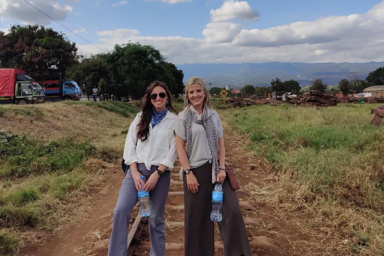 Moshi or Arusha: Guided Town Tour , Market and shopping By using- Tuku Tuku