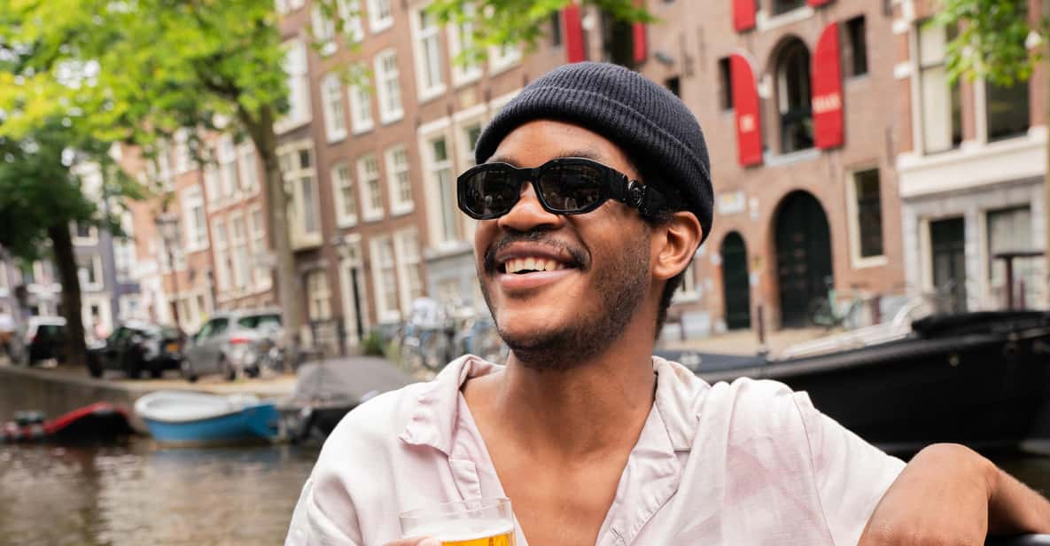 Afbeelding 20 van Amsterdam: begeleide open boottocht met onbeperkt drankjes