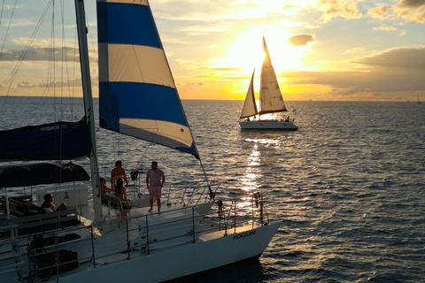 Waikiki: Sunset Swim & Sailing Experience